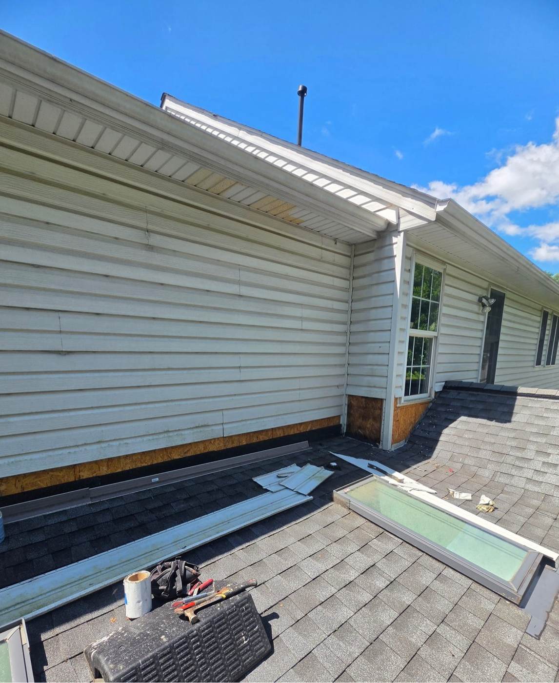 A Maryland-area roof stripped to its sheathing during a full rebuild — this is what a roof replacement actually looks like mid-project.